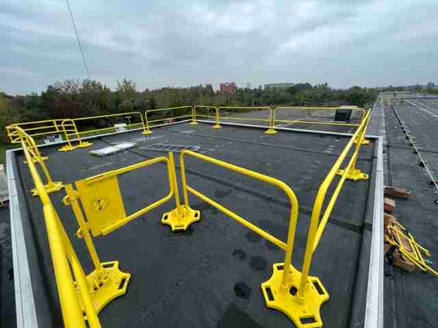 safety rail system on a roof to protect site and workers from falls and accidents