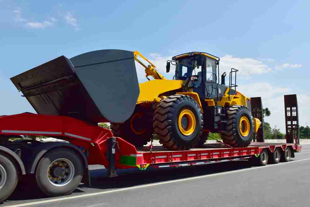 construction equipment delivery to a site in florida from atlantic equipment professional services