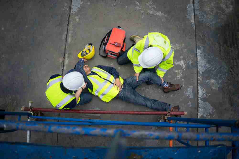 construction worker falling on site due to improper equipment and safety precautions for slips trips and falls